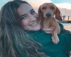 She is an animal lover and enjoys playing with them in her spare time.